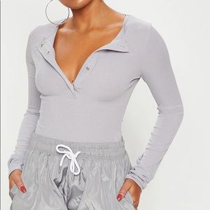 PRETTYLITTLETHING Long Sleeve Rib Popper Bodysuit